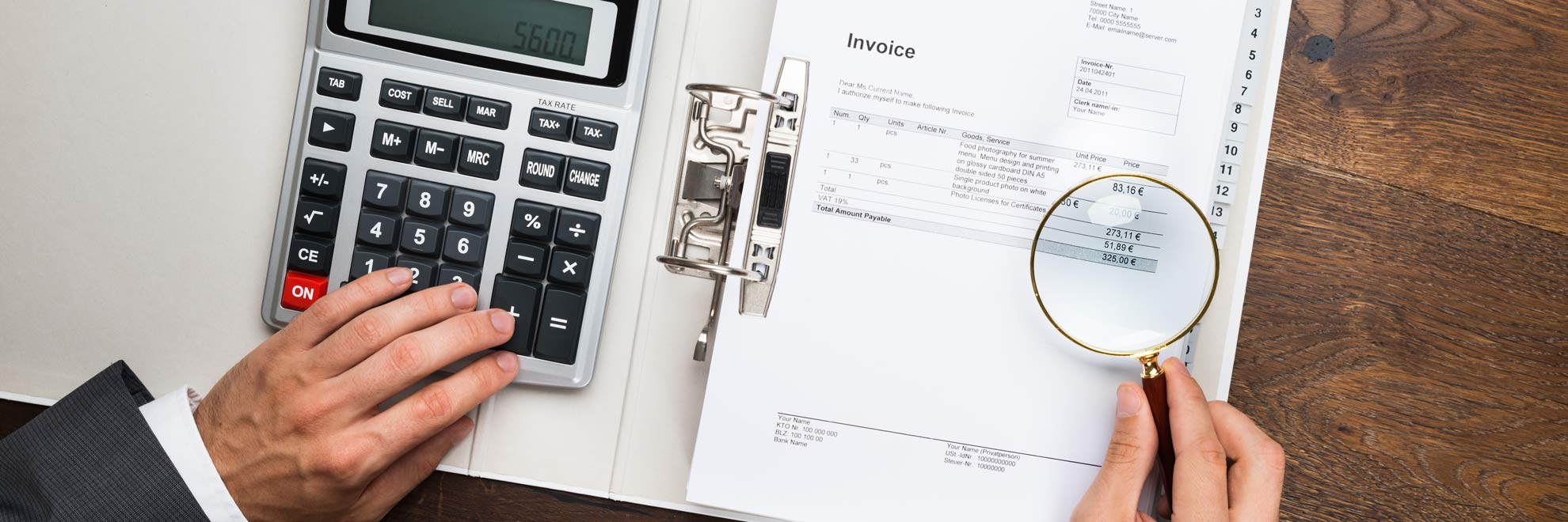 magnifying glass invoice